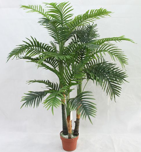 Artificial palm in a terracotta pot