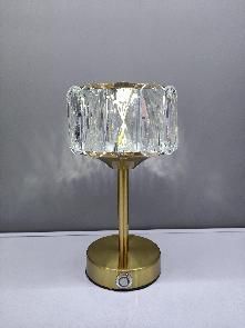 Table lamp with a cut-glass shade
