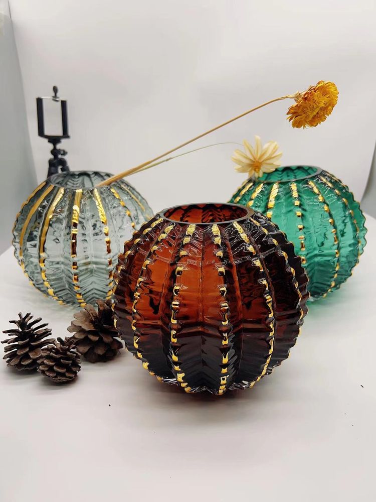 Ribbed coloured glass globe vases