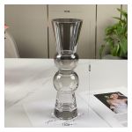 Tall clear glass vase with a bulb