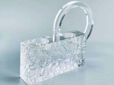 Clear textured decor piece with a ring
