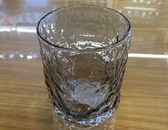 Smoky hammered glass tumbler