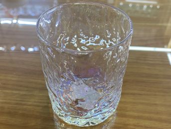 Iridescent hammered glass tumbler