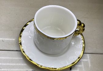 White coffee cups with a gold ball handle, set of 6